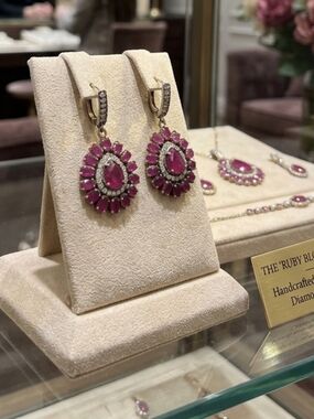 Genuine Ruby," "Diamond Halo," "Heirloom Style," "Sterling Silver 925," "July"